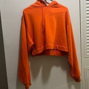 Orange ALO YOGA cropped sweatshirt